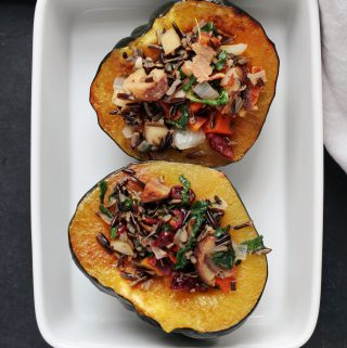 wild rice, kale, chestnut and cranberry stuffed acorn squash