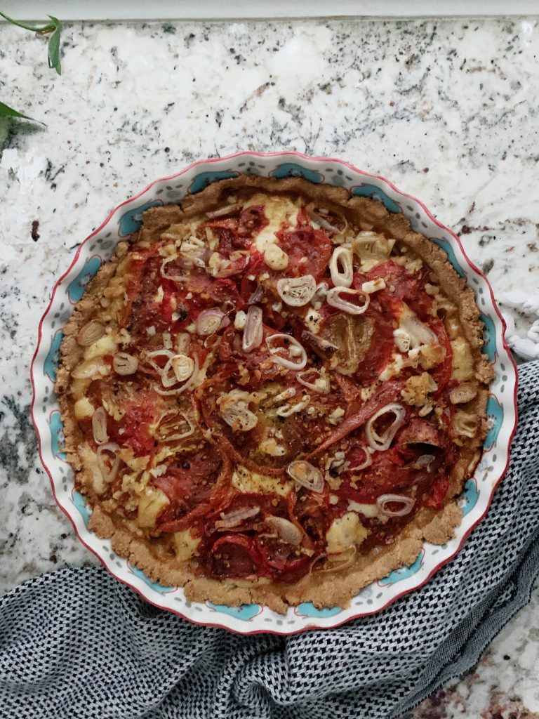 roasted tomato parmesan garlic pie with shallots
